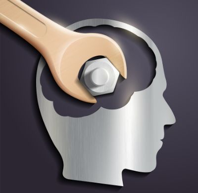 Ein stilisierter Kopf mit einem Schraubenschlüssel